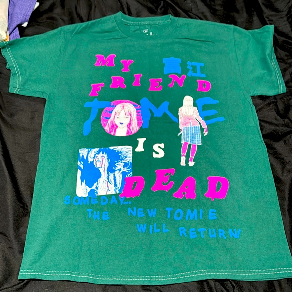 New size medium green T-shirt that says my friend tome is dead. Funny tee nwt